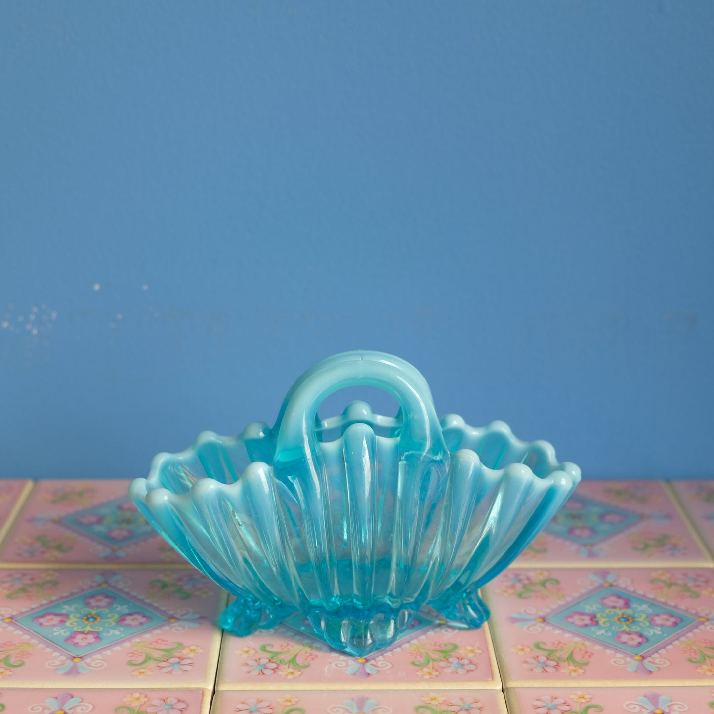 Vintage light blue glass basket