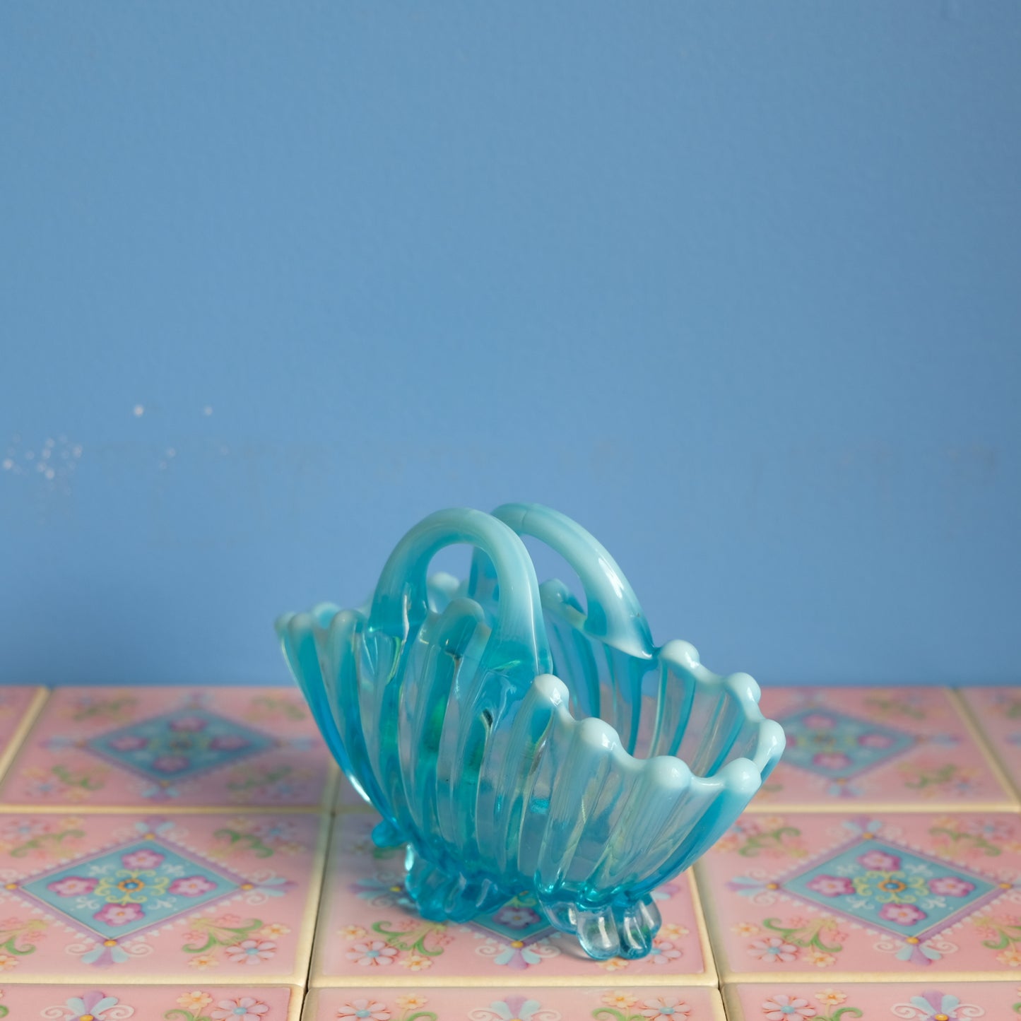 Vintage light blue glass basket